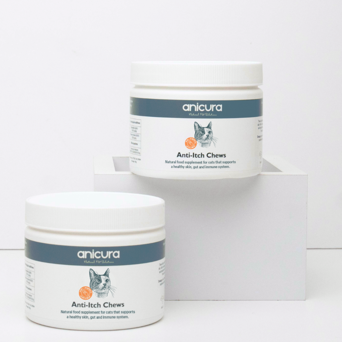 Two containers of anicura Anti-Itch Chews on a white background